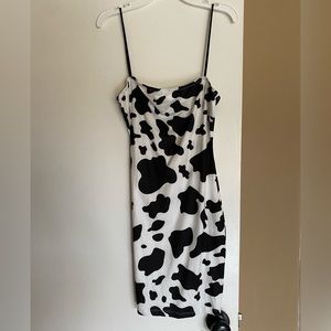Cow print mid length dress. Size: Small, 4